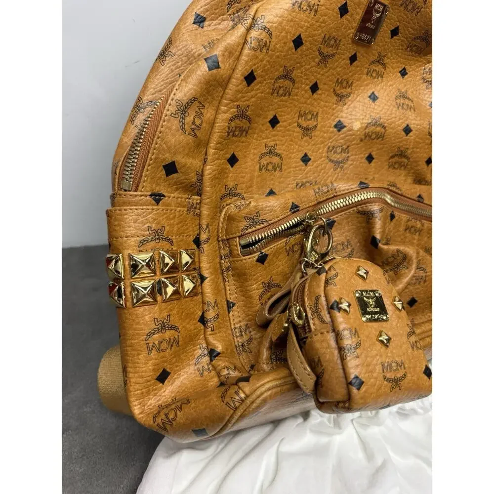 MCM Stark Side Studs Medium Cognac Visetos Backpack Pouch Dust Bag